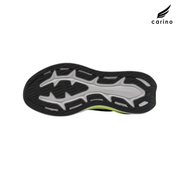 The outsole of a Carino athletic shoe, showing a black and gray tread pattern with a small neon green accent visible on the heel, set against a plain white background with the Carino logo in the top right.